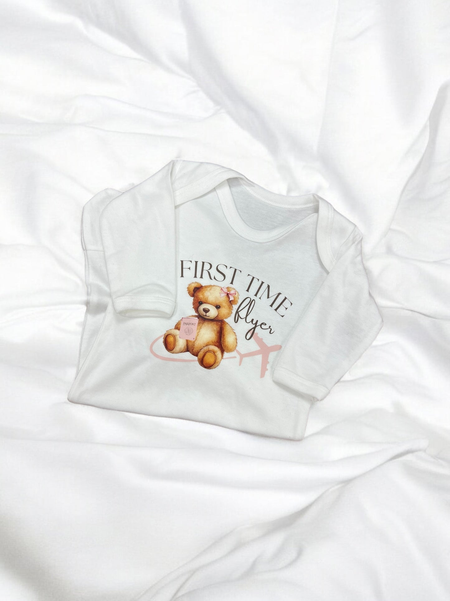 3-6mths first time flyer Babygrow